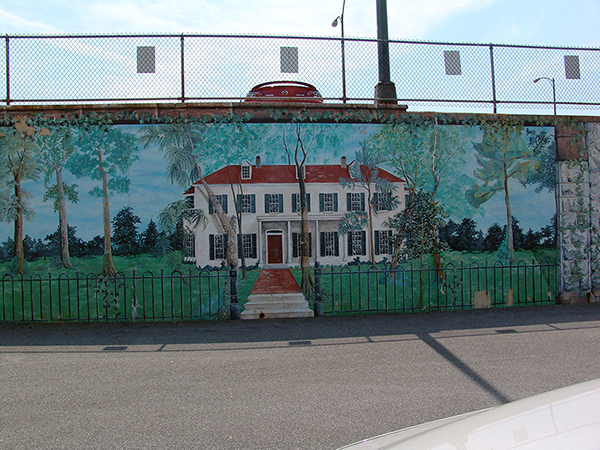 Painting of Mount Prospect on the south wall of the parking lot.